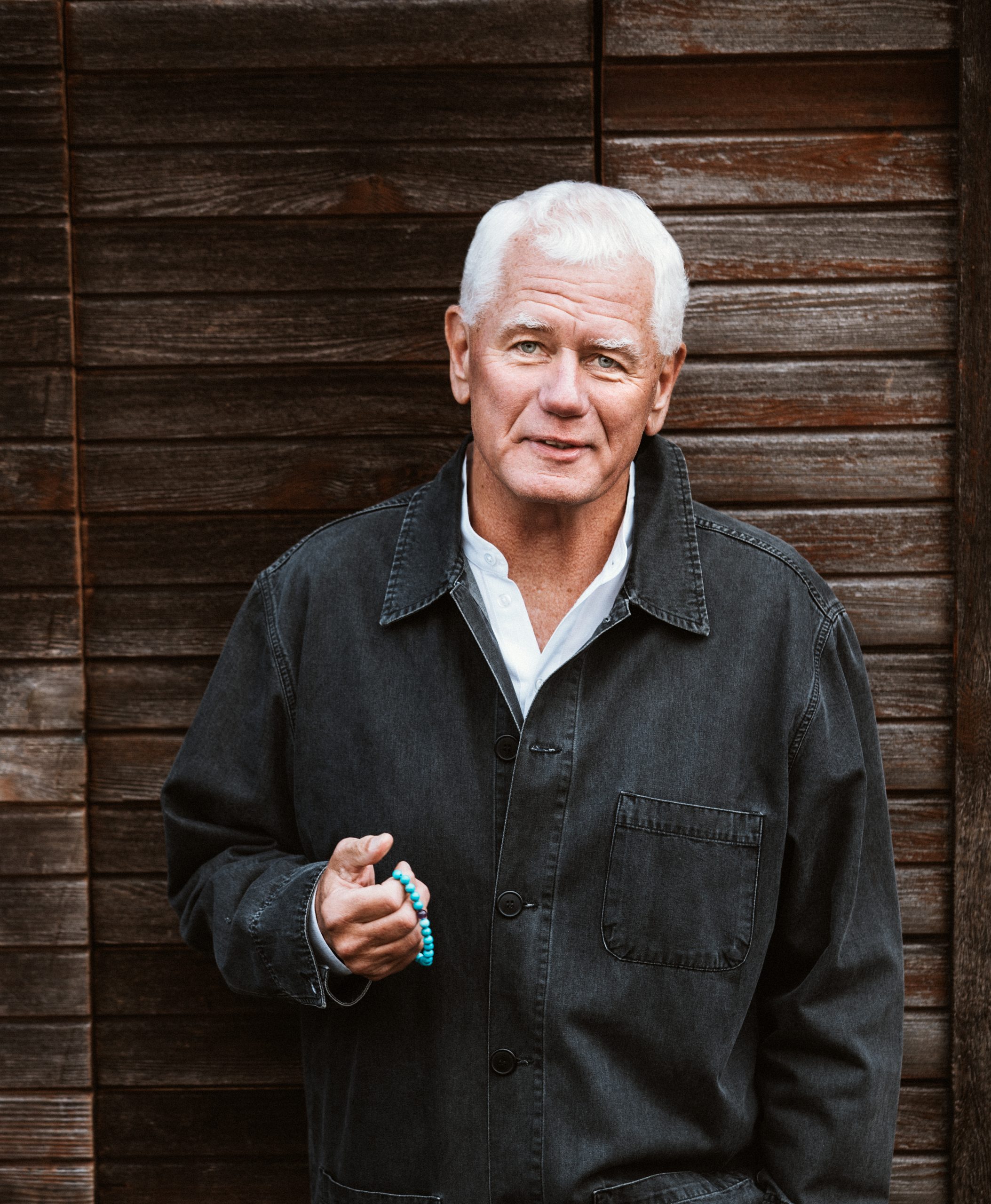 Frank Ostaseski holding beads